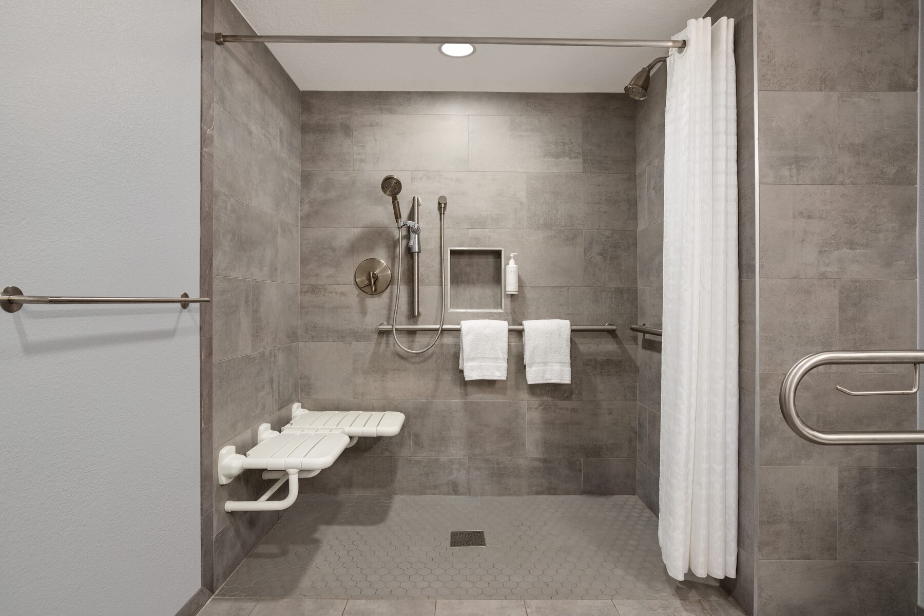 ADA accessible king room with roll-in shower at Home Inn and Suites Apopka Florida