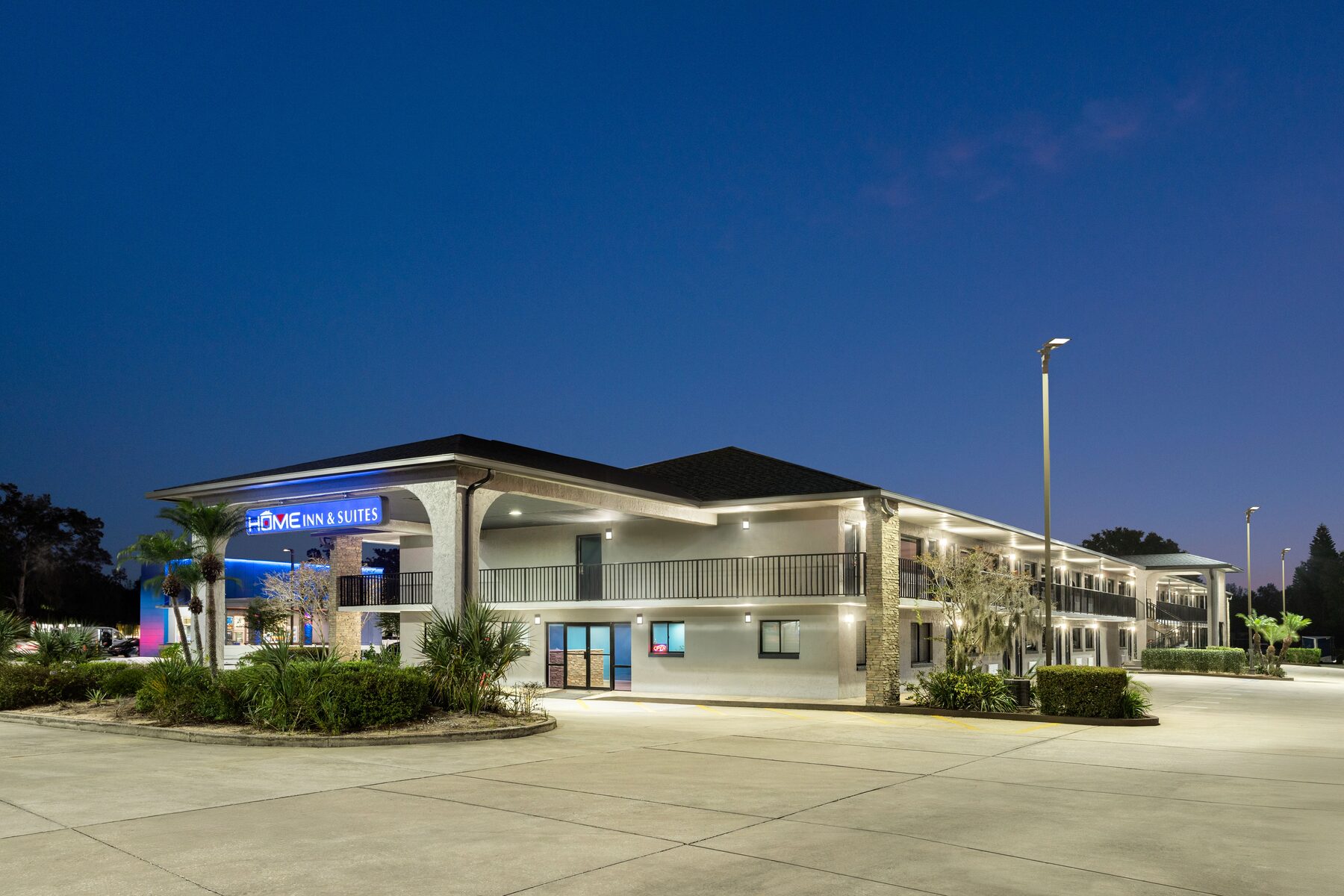 Home Inn and Suites Apopka Florida hotel exterior evening view