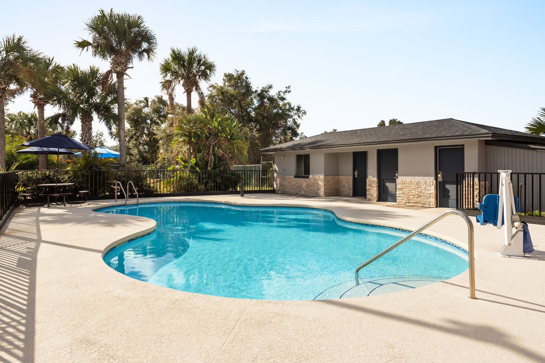 Outdoor swimming pool at Home Inn and Suites Apopka Florida